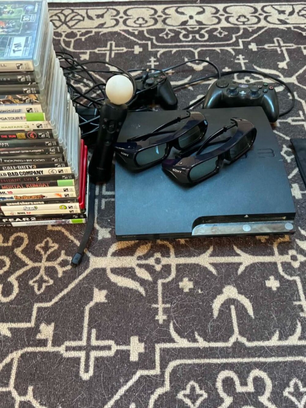 Playstation 3 Slim with 22 Amazing andopular Games! All are in amazing condition